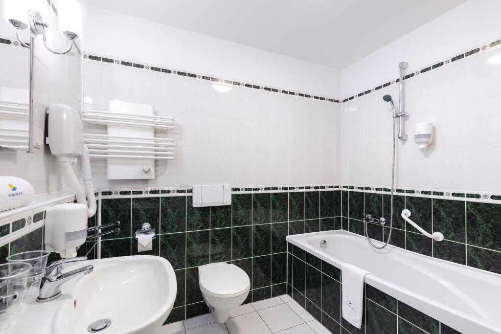 Kúpeľňa v ubytovaní Interferie Sport Hotel Bornit