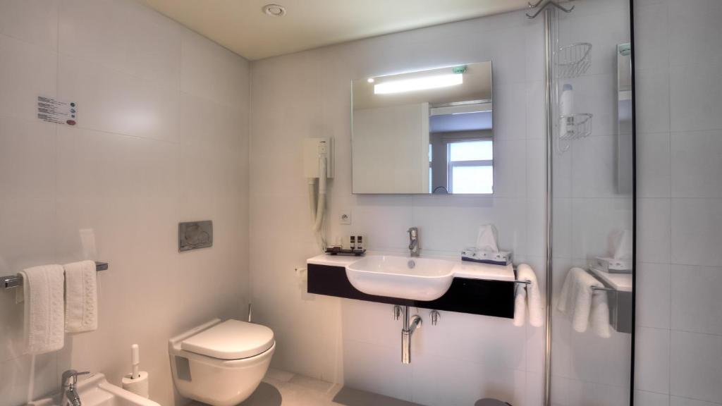 Koupelna v ubytování Hotel Tristar