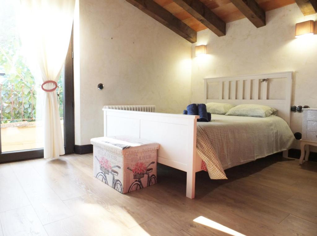 Posteľ alebo postele v izbe v ubytovaní Villa Tranquila a charming 4bedroom villa with air-conditioning & private swimming pool