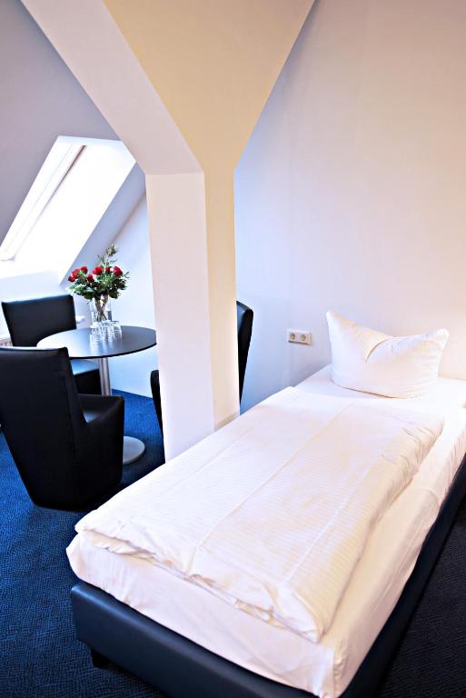 Postel nebo postele na pokoji v ubytování Hotel Transit Loft