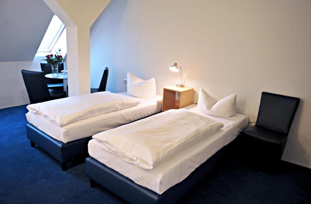 Postel nebo postele na pokoji v ubytování Hotel Transit Loft
