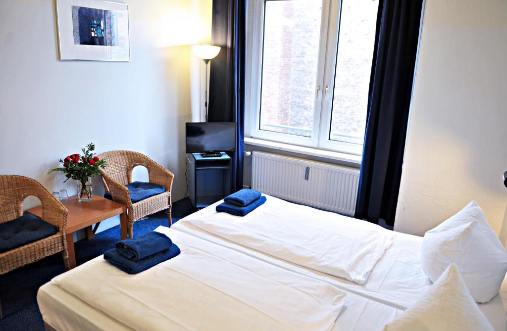 Postel nebo postele na pokoji v ubytování Hotel Transit Loft