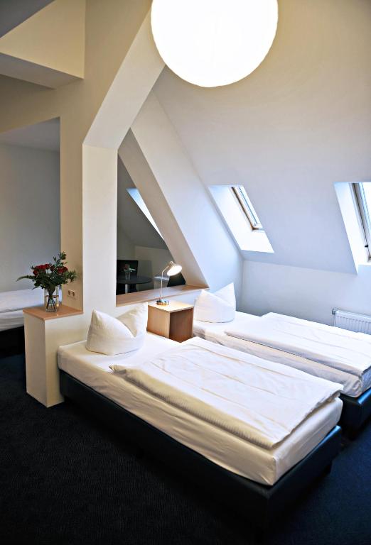 Postel nebo postele na pokoji v ubytování Hotel Transit Loft