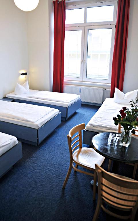 Postel nebo postele na pokoji v ubytování Hotel Transit Loft