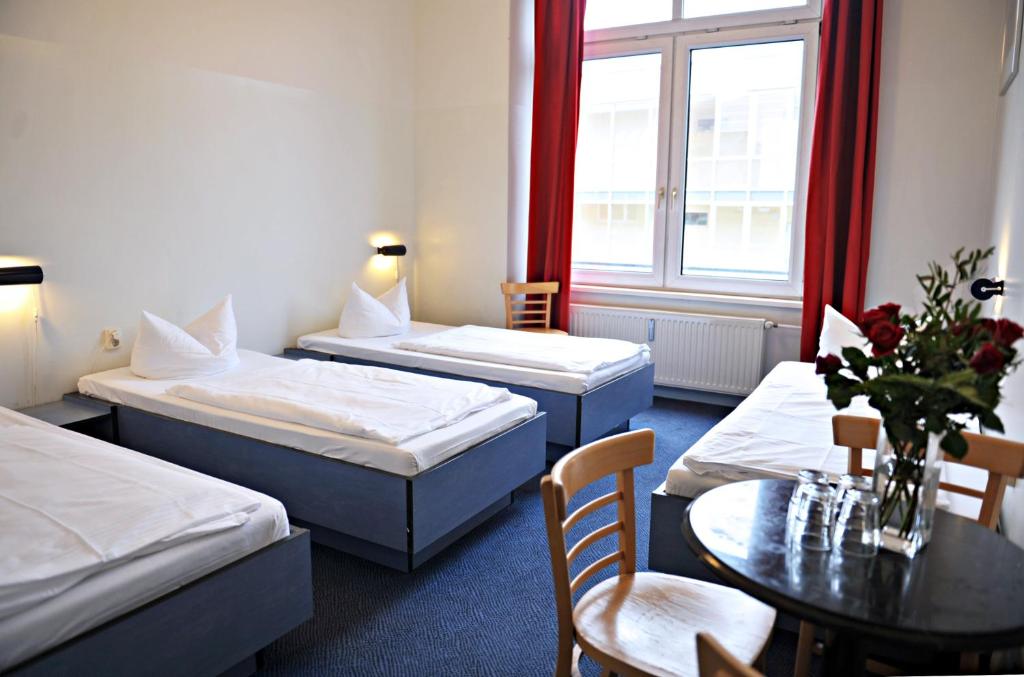 Postel nebo postele na pokoji v ubytování Hotel Transit Loft
