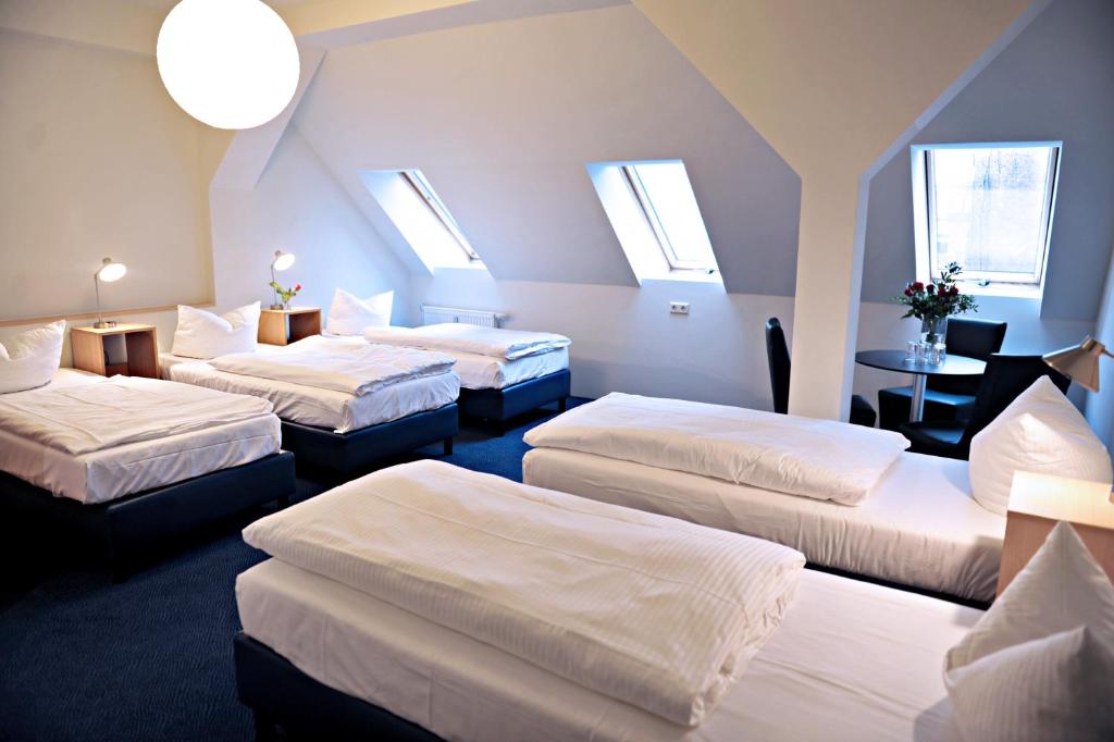 Postel nebo postele na pokoji v ubytování Hotel Transit Loft