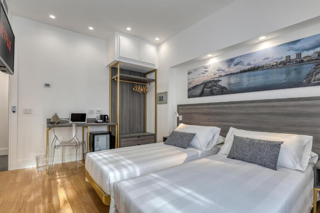 Posteľ alebo postele v izbe v ubytovaní Gallery Suite