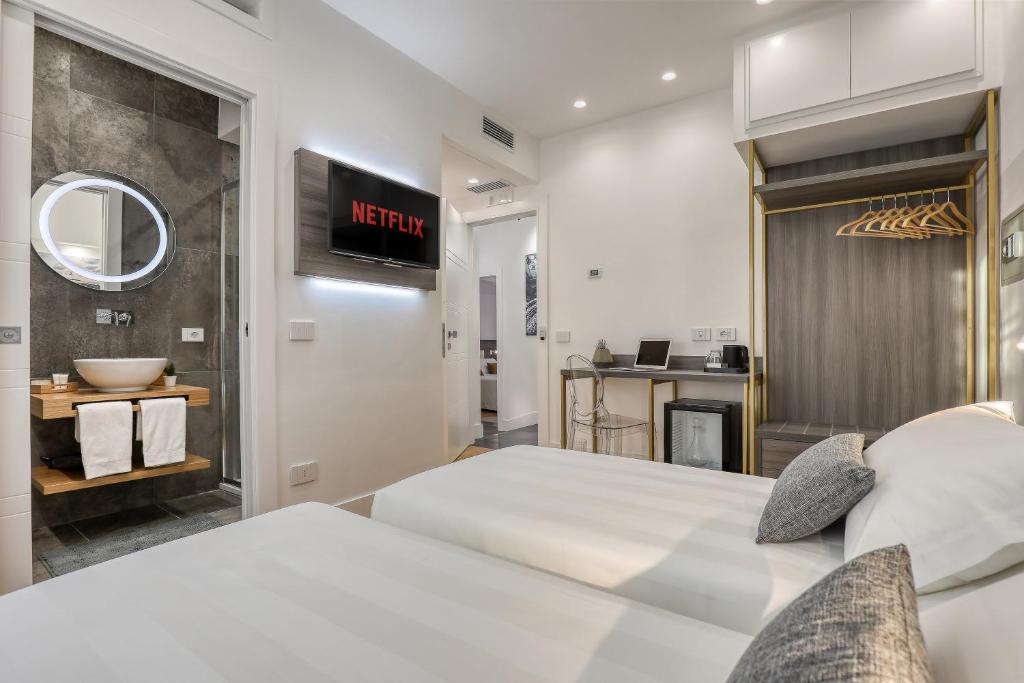 Posteľ alebo postele v izbe v ubytovaní Gallery Suite