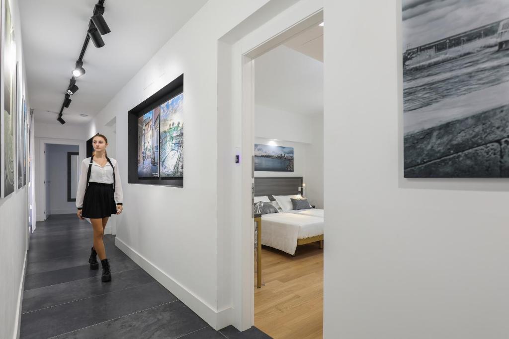 Posteľ alebo postele v izbe v ubytovaní Gallery Suite