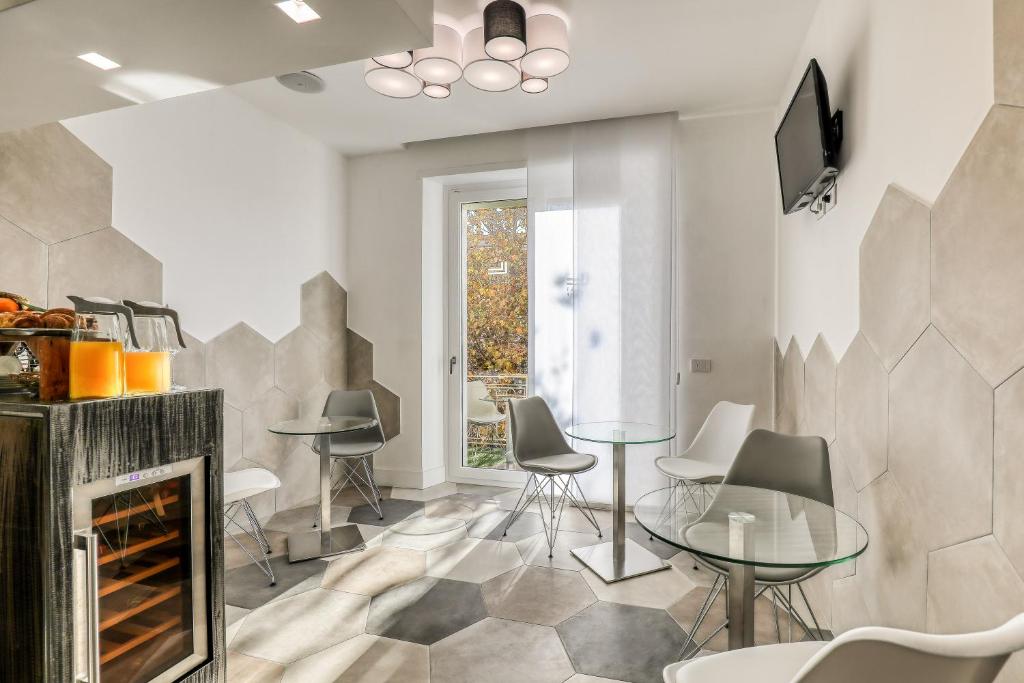 Televízia a/alebo spoločenská miestnosť v ubytovaní Gallery Suite