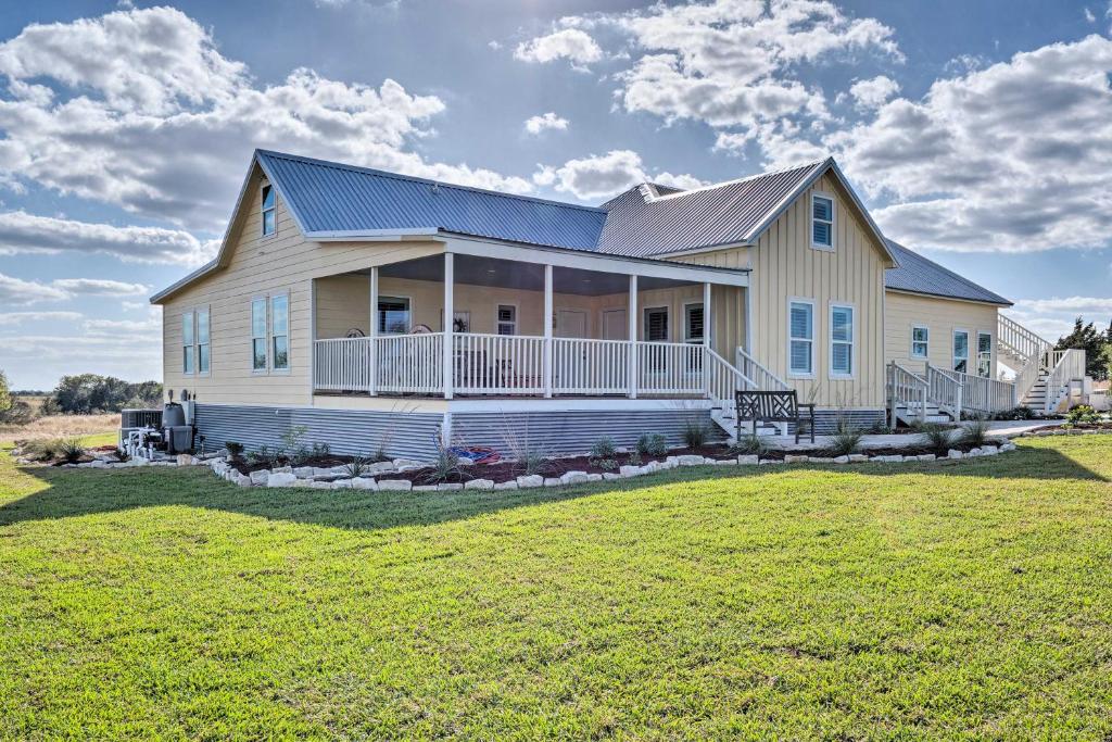 a large house with a large yard at Pool, Hot Tub and Game Room Schulenburg Retreat in Schulenburg