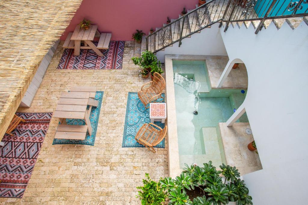 Balkón nebo terasa v ubytování BOHO Bohemian Boutique Hotel