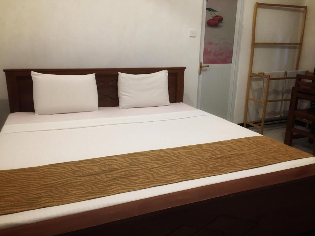 Letto o letti in una camera di The Nest