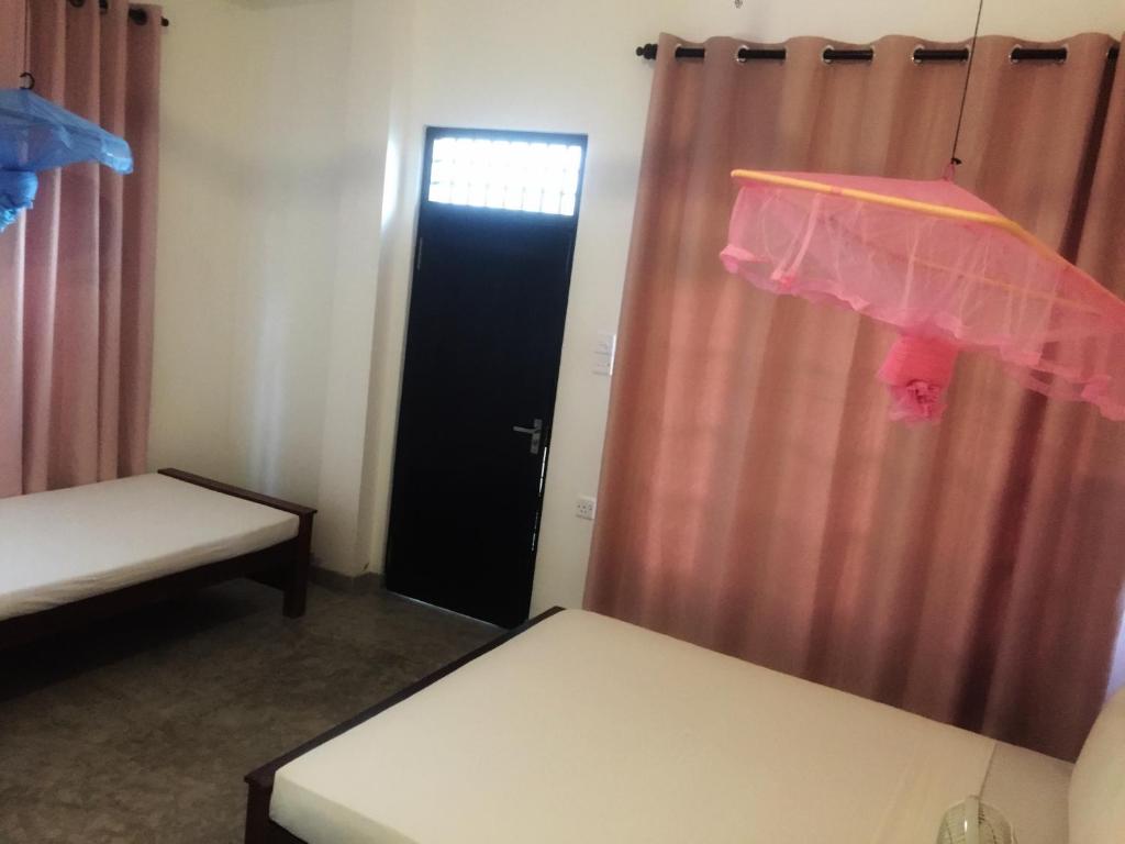Letto o letti in una camera di The Nest