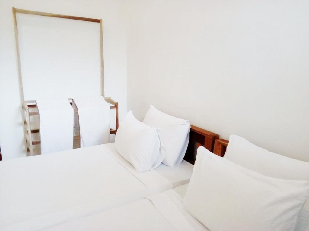Letto o letti in una camera di The Nest
