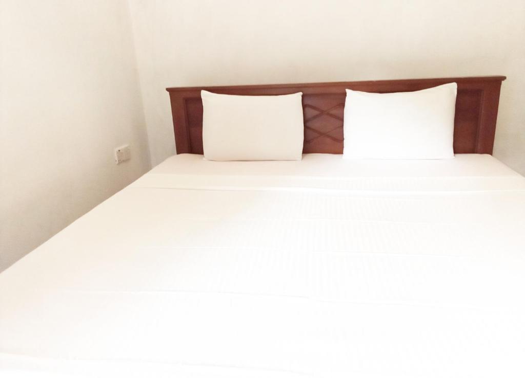 Letto o letti in una camera di The Nest