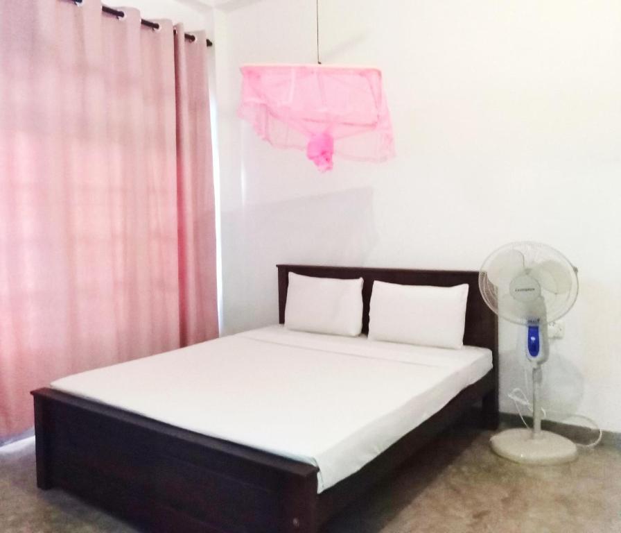 Letto o letti in una camera di The Nest