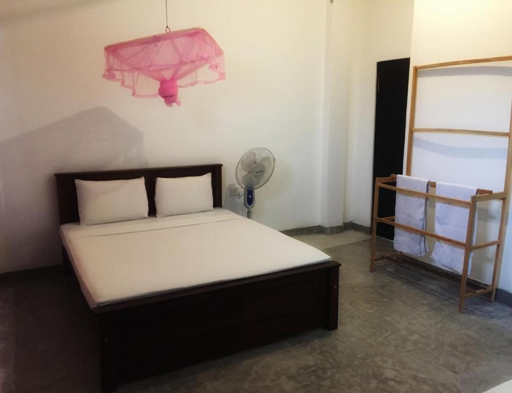 Letto o letti in una camera di The Nest