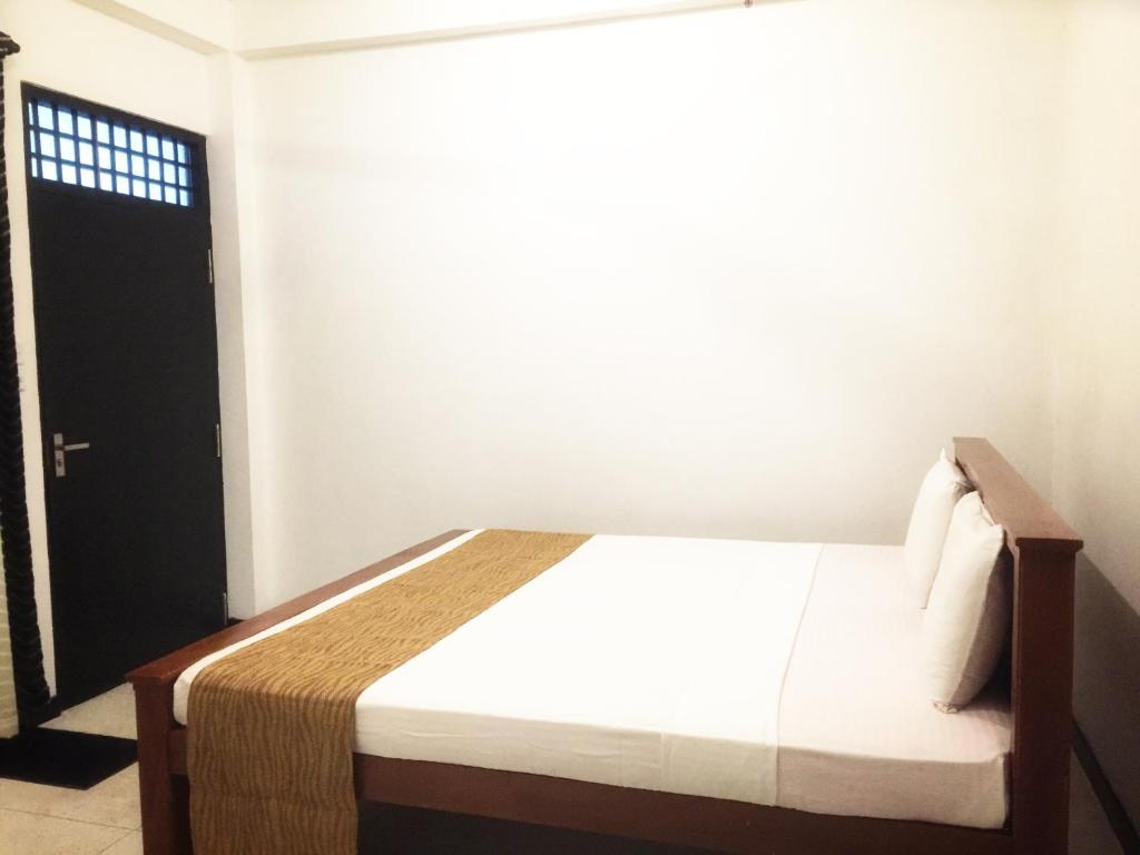 Letto o letti in una camera di The Nest