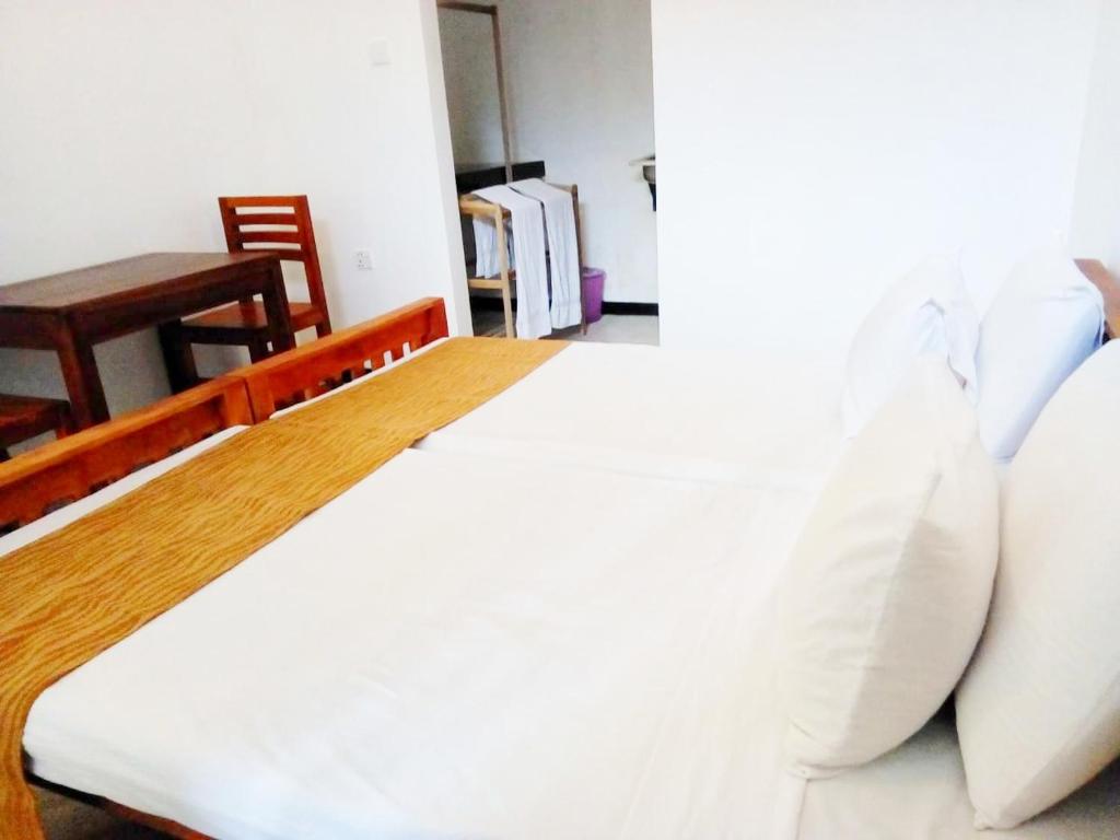 Letto o letti in una camera di The Nest