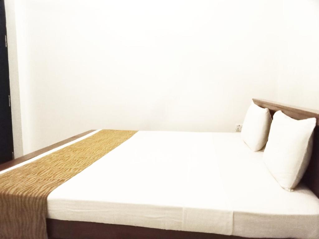 Letto o letti in una camera di The Nest