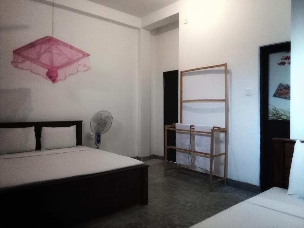 Letto o letti in una camera di The Nest