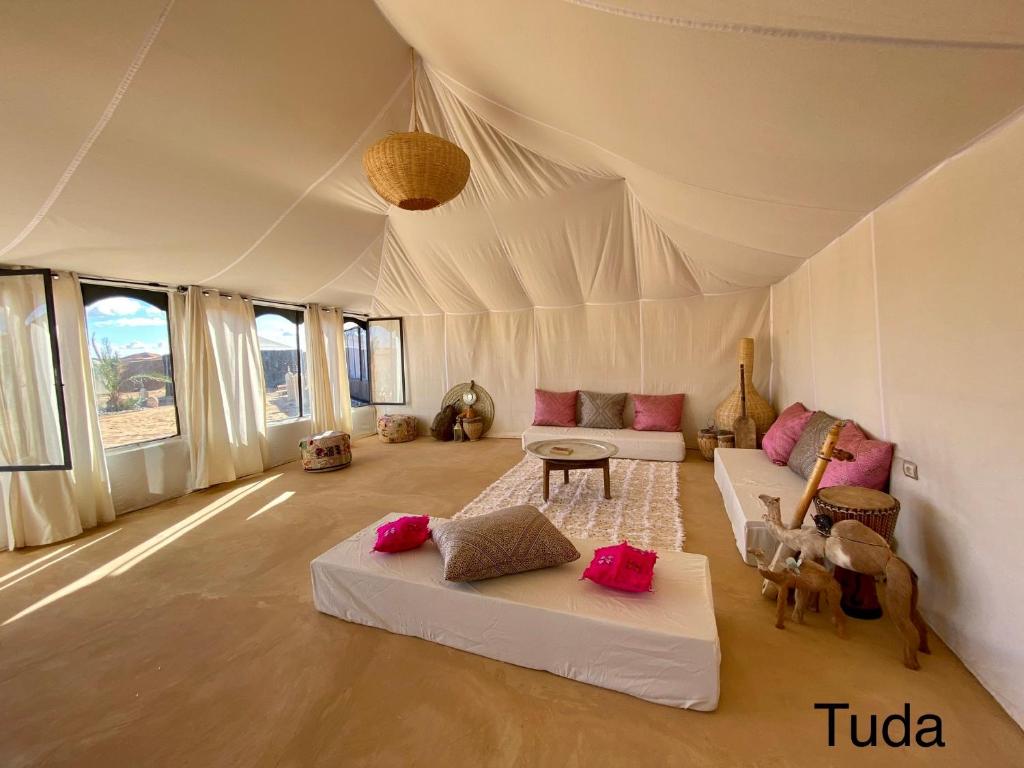 Postel nebo postele na pokoji v ubytování Tuda Luxury Camp