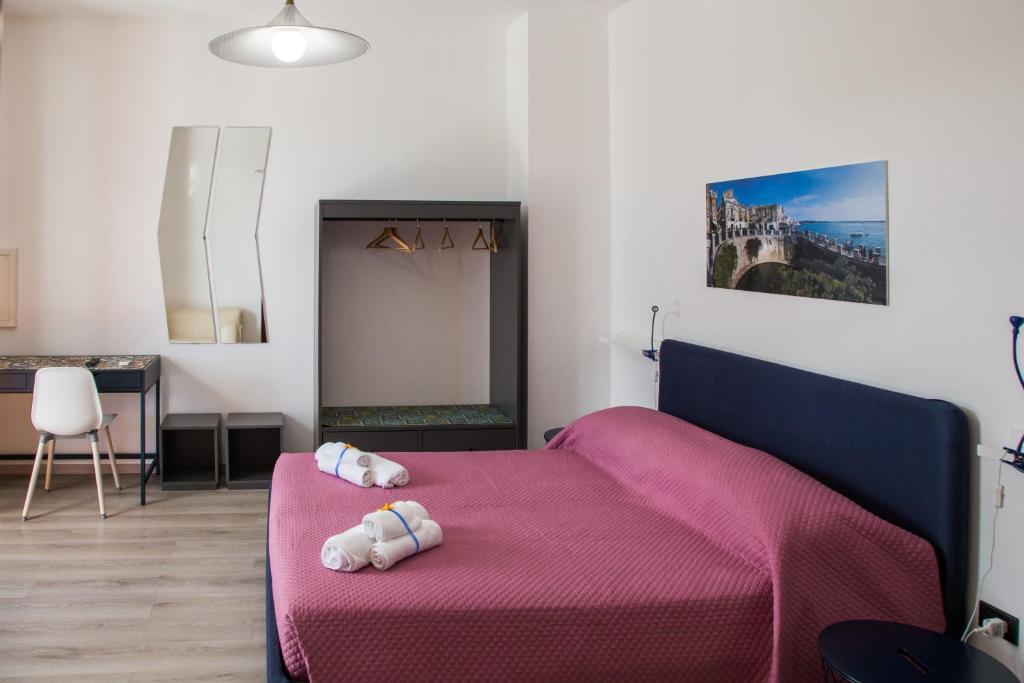 Postel nebo postele na pokoji v ubytování VILLA VEGA