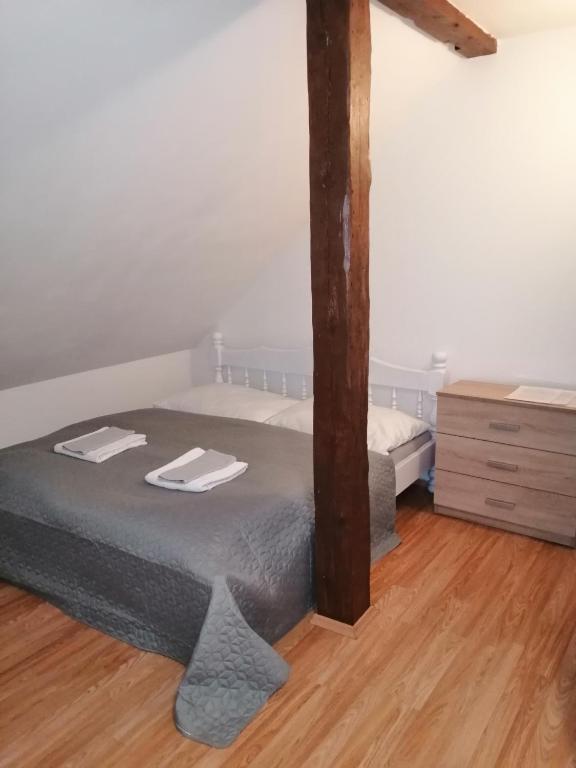 Postel nebo postele na pokoji v ubytování Penzion U Walterů