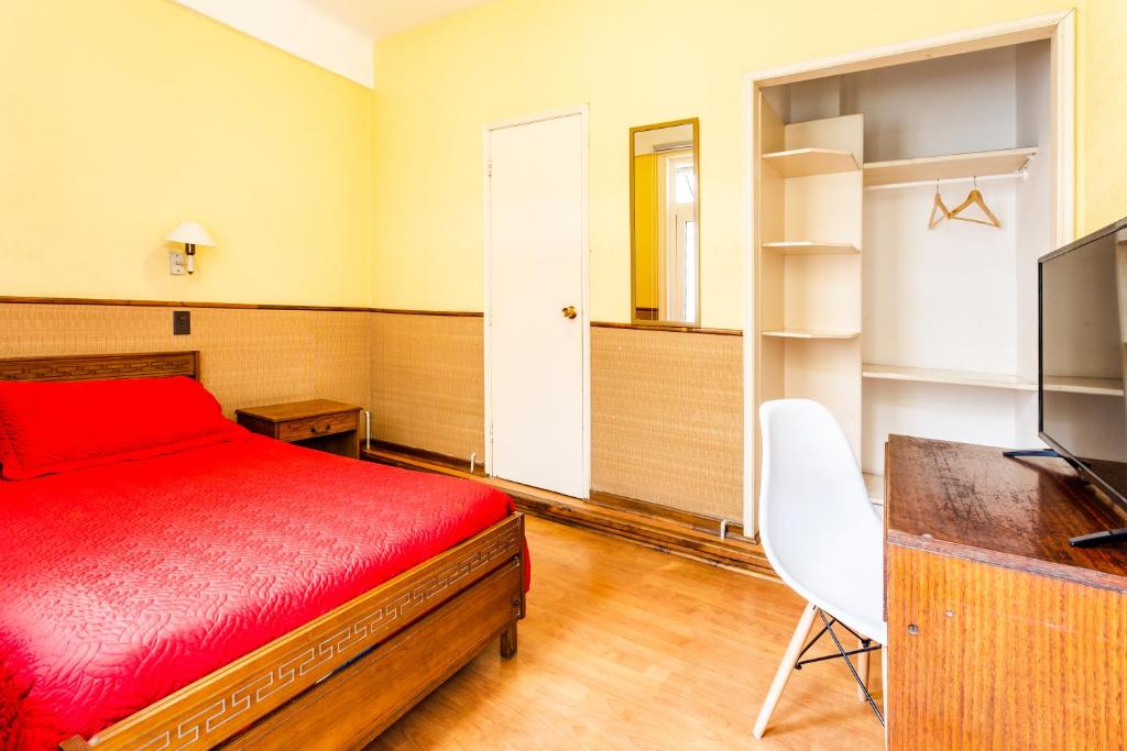 TV a/nebo společenská místnost v ubytování Hostel Del Puerto