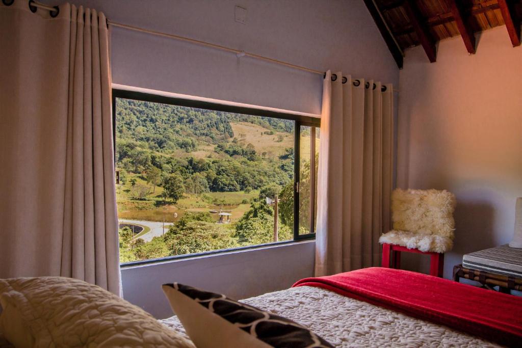 A bed or beds in a room at Villa Garibaldi