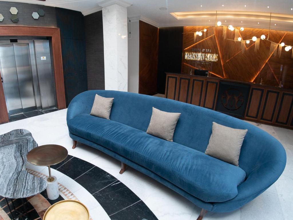 Posezení v ubytování HOTEL & SPA MANSION SOLIS by HOTSSON