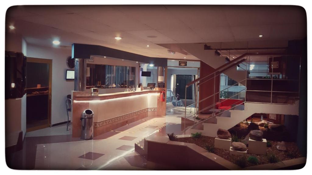Kuchyň nebo kuchyňský kout v ubytování Hotel Enterprise Inn Plaza
