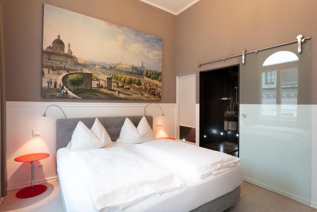 Boutique Hotel Columbiaにあるベッド