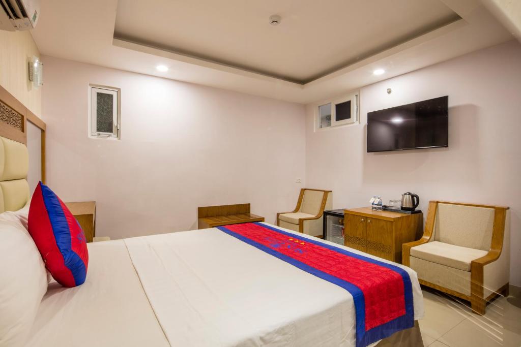 TV a/nebo společenská místnost v ubytování Sun City Hotel