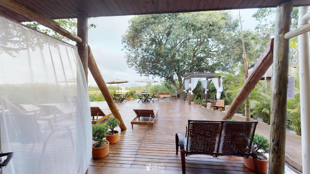Uma varanda ou terraço em Pousada Villa Verde - Frente para a Praia do Farol