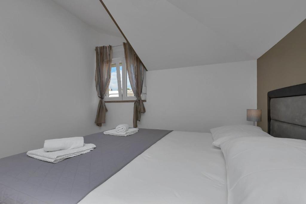 Posteľ alebo postele v izbe v ubytovaní Top View Apartment