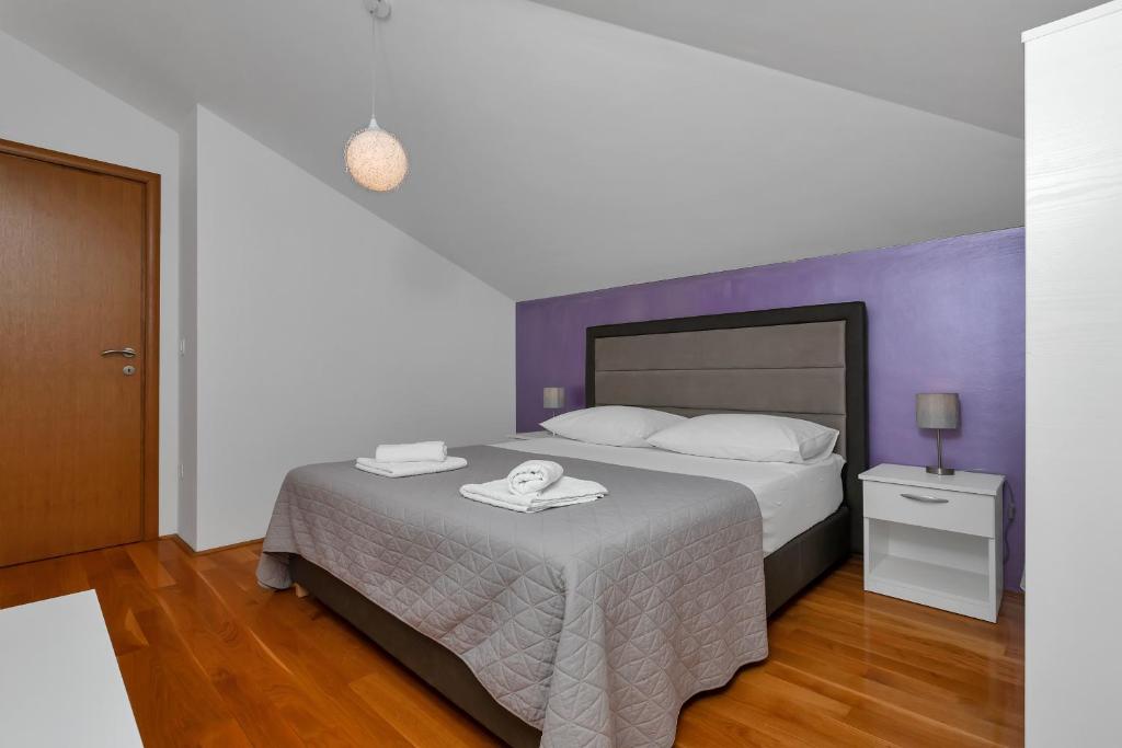 Posteľ alebo postele v izbe v ubytovaní Top View Apartment