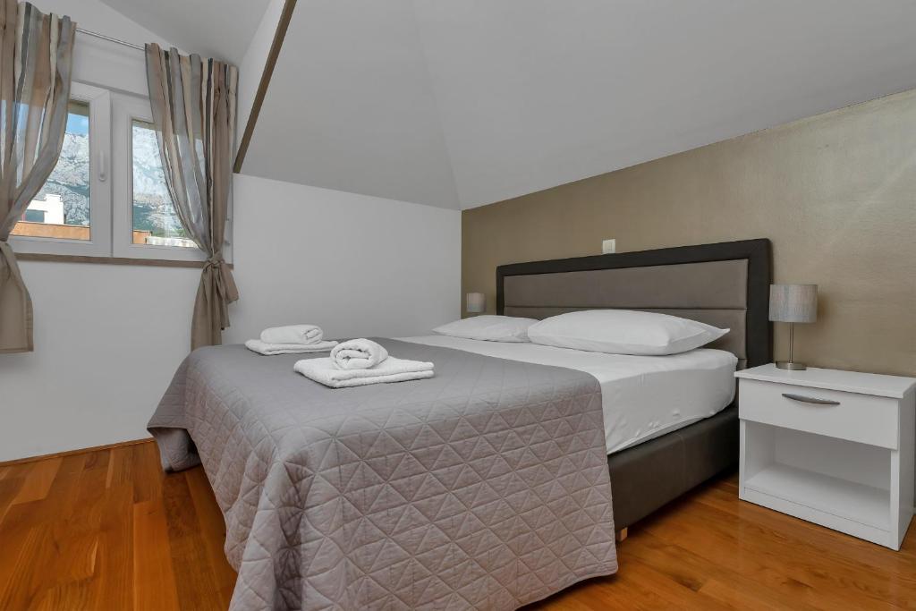 Posteľ alebo postele v izbe v ubytovaní Top View Apartment