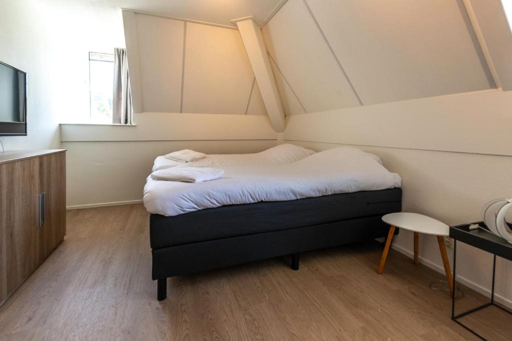 Postel nebo postele na pokoji v ubytování Resort Citta Romana