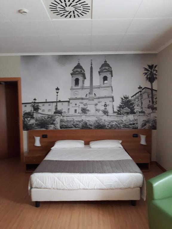 Postel nebo postele na pokoji v ubytování Ele Green Park Hotel Pamphili