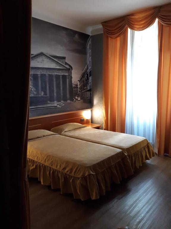 Postel nebo postele na pokoji v ubytování Ele Green Park Hotel Pamphili