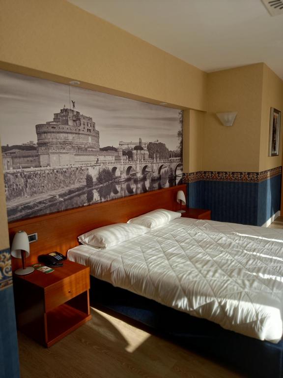 Postel nebo postele na pokoji v ubytování Ele Green Park Hotel Pamphili