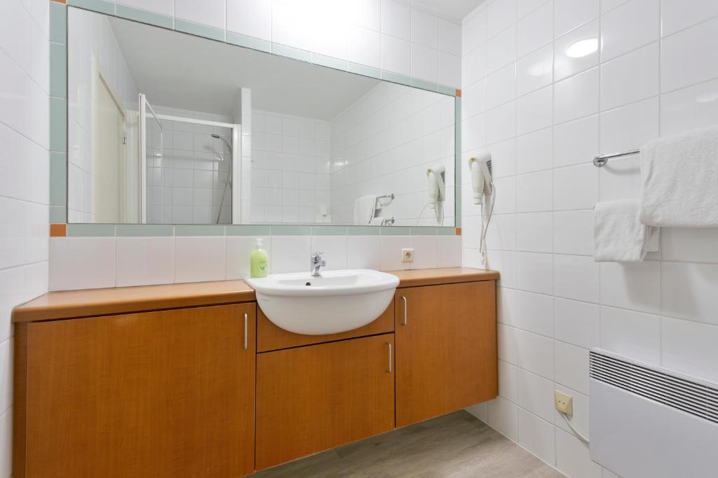 Koupelna v ubytování Verac Flats