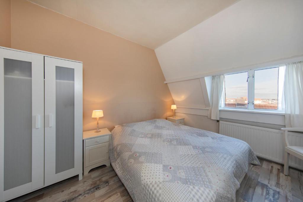 Postel nebo postele na pokoji v ubytování Blankebil Rooms