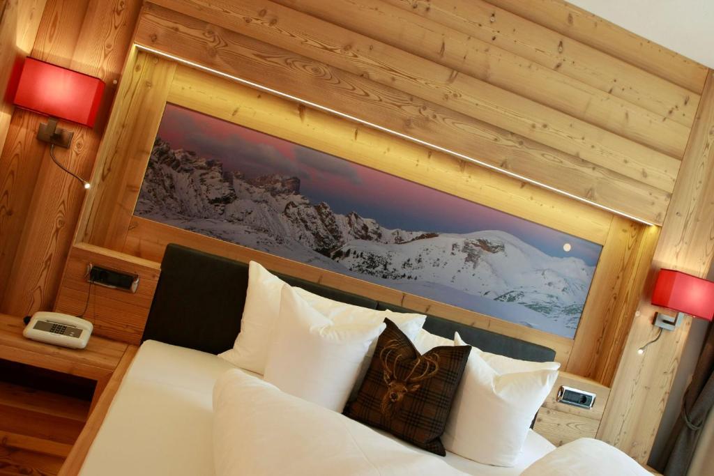 Postel nebo postele na pokoji v ubytování Hotel Valpudra