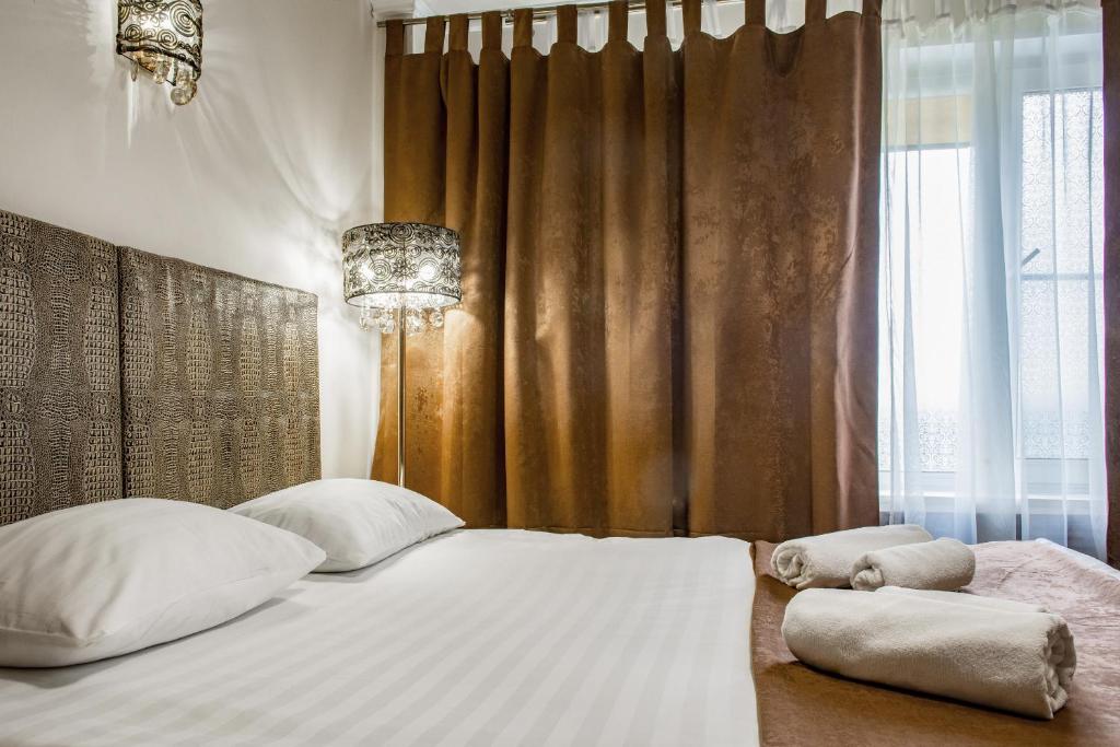 Кровать или кровати в номере Hotel Strogino Expo