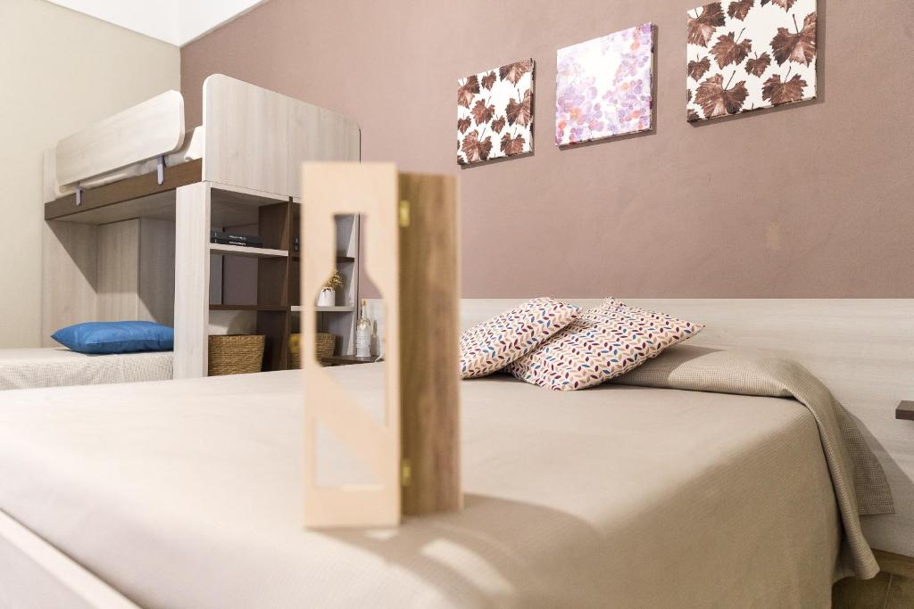 Postel nebo postele na pokoji v ubytování B&B Radici