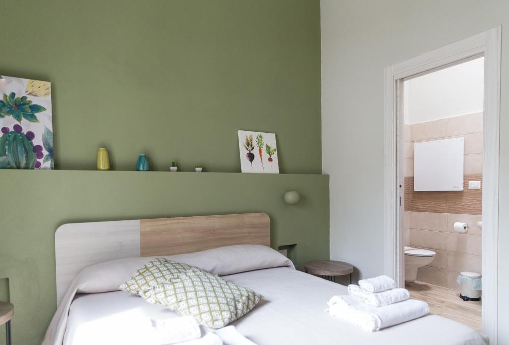 Postel nebo postele na pokoji v ubytování B&B Radici