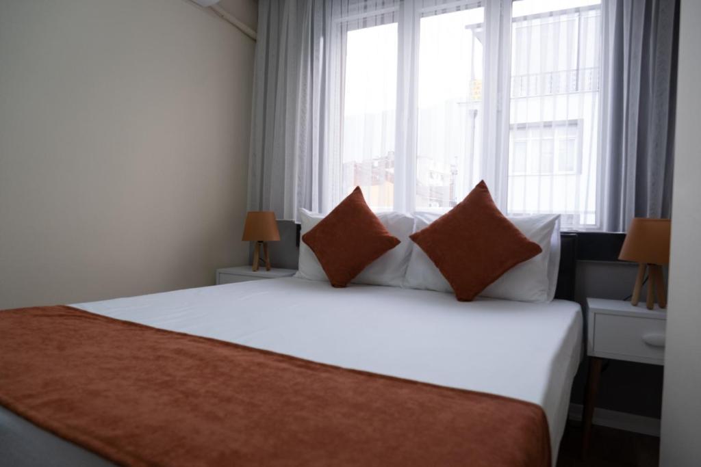 Кровать или кровати в номере GREEN SUITES BURSA